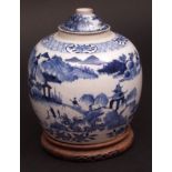 Chinese blue and white porcelain ginger jar and mis-matched cover, painted with mountainous temple