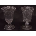 Two 19th century glass celery vases, each with everted hipped rims, faceted bodies and star cut