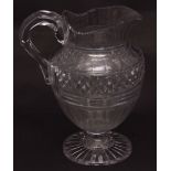Late 18th century Irish faceted large globular ewer with star cut spreading circular foot, 10ins