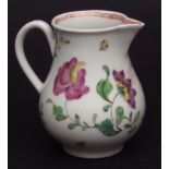 Unusual Worcester cream jug, circa 1770, painted with floral sprays with scattered sprays and