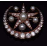 A diamond cultured pearl crescent and star brooch/pendant set throughout with 38 graduated old