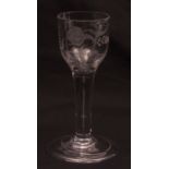 18th century wine glass, the bowl engraved with a sprig of foliage, plain stem, spreading circular