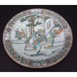 Large Chinese porcelain dish, finely enamelled in famille vert colours with scholars and maidens