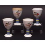 Four Chinese porcelain goblets decorated in famille rose enamels, with insect and fruit sprays, 5ins