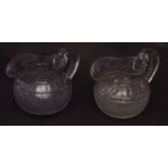 Two squat hobnail cut water jugs of baluster form, circa early 19th century, 5 1/2 ins high