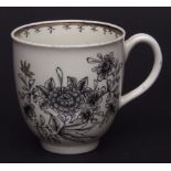 Worcester coffee cup with black pencilled decoration of flower and peony, circa 1770, 2 1/2 ins high