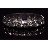 Precious metal diamond eternity ring, set with eighteen small brilliant cut diamonds (0.10ct