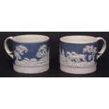 Two mid-19th century Ridgways mugs, the blue ground with sprigged hunting decoration, 3 1/2 ins high