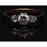 Three stone diamond ring, the principal brilliant cut diamond is (0.30ct approx), flanked by two