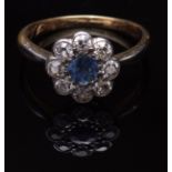 Early 20th century sapphire and diamond cluster ring, the circular cut sapphire (4mm diameter),