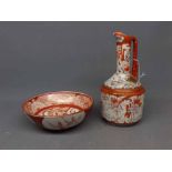 Japanese Kutani decorated ewer together with a similar rust ground stylised bowl with printed