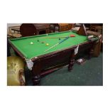 Riley 8x4ft snooker table with a slate bed and six heavy turned supports, together with snooker