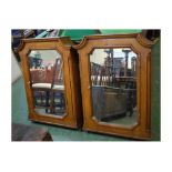 Pair of 19th century oak single mirrored door apothecary cabinets with fitted interiors and shaped