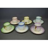 Set of four Royal Albert rainbow tea cups and saucers with gilded handles of varying colours (6)