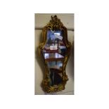 Small reproduction scroll framed wall mirror, 16ins high