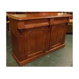 Victorian mahogany sideboard fitted with two shaped drawers over two arched panel doors, 53ins x