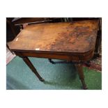 19th century mahogany fold-over card table with green baize lining on half-fluted and turned legs on