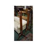 Pair of 19th century mahogany plant stands with circular galleried tops on a reeded column on a