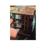 Late 19th or early 20th century mahogany revolving bookcase with satinwood inlaid detail to top