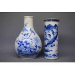 Two Chinese 19th century blue and white vases, one of cylindrical form with fluted rim with