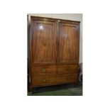 Altered mahogany linen press with three drawers under, 19th century, 42ins wide