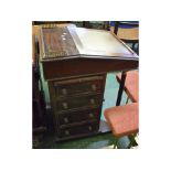 19th century mahogany Davenport with lift up top, green leather insert and brass galleried back,