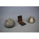 Miniature granite and silver topped curling stone, together with a silver table lighter in the