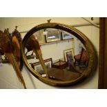 Lacquered floral moulded framed oval decorative wall mirror, 28ins wide