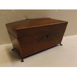 19th century mahogany and satinwood banded sarcophagus tea caddy with three compartments to