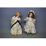 French and German bisque headed doll, each with composition bodies, both approx 8ins long (2)