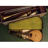 Rexine cased Mandolin together with an Academy 403 rexine cased trombone (2)