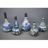 Pair of Chinese blue and white spill vases with plated necks, together with three varying sized blue