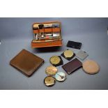 Box to include a leather cow hide travelling vanity case, a quantity of mixed gilt metal ladies