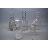 Mixed Lot: four assorted decanters to include a pair of three-ringed mallet formed decanters,