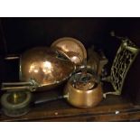 Victorian copper urn shaped samovar with raised handles, together with a further brass trivet, a