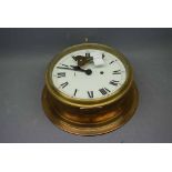 Vintage brass circular ship's clock with Arabic chapter ring, 11ins diam