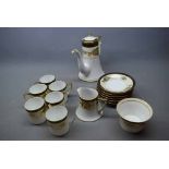Noritake cream and floral gilded rim tea set with a white glazed body, comprising a tea pot, cream
