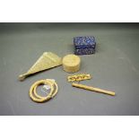 Mixed Lot: Chinese pierced ivory fan (a/f), cigarette holder, buckle, two bangles together with an