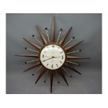 1970s Smith's teak starburst wall hanging clock with quartz movement, 19ins diam