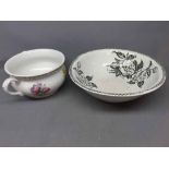 Victorian floral printed chamber pot together with a further black and white Edge Malkin & Co floral