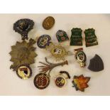 Box containing mixed military cap badges, enamelled badges etc