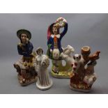 Group of four reproduction Staffordshire figures to include a Scottish huntsman, together with a