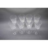 20th century set of eight wine glasses with faceted stem on a circular base with a cut glass bowl,