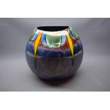 Modern Poole Pottery vase of ovoid form with a blue lustre glaze and decorative neck, 11ins tall