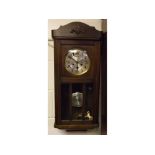 Mid-20th century oak framed drop dial clock with three glazed panels and a silvered dial, 13ins wide