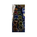 Twenty assorted Holkham Pottery tankards