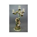 Late 19th century Sitzendorf porcelain cherub mounted four-light candelabrum of two parts, blue