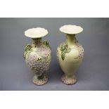 Pair of 19th century Continental two-handled vases with a raised decoration of a tree in full