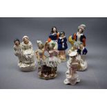 Group of six Staffordshire flat back figures comprising two young dancers, a spill vase of a lady