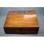 Georgian mahogany student's writing slope with sloped top, two square cut outs for inkwells (